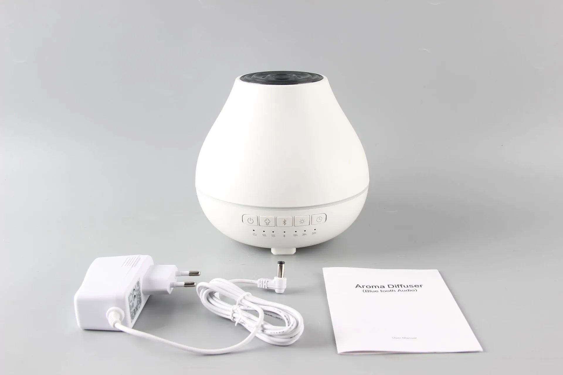 White round Bluetooth humidifier and aroma diffuser with night light functions