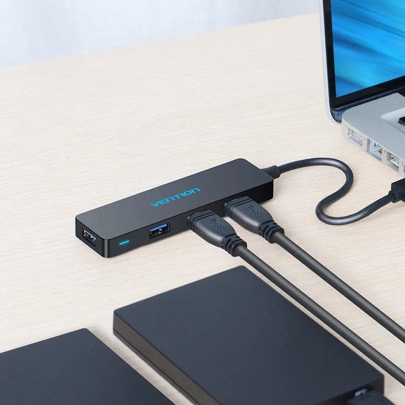 Black USB 3.0 four-port hub with 15cm cable and nickel-plated connectors