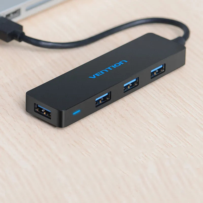 Black USB 3.0 four-port hub with 15cm cable and nickel-plated connectors