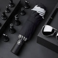 Black automatic reverse umbrella with reflective elements and plastic non-slip handle