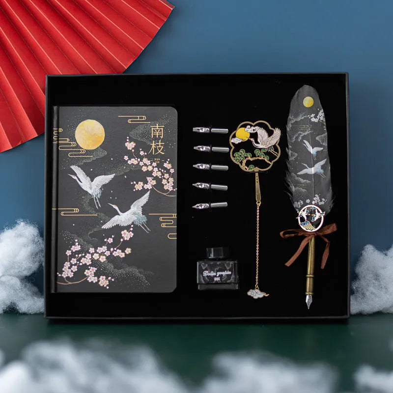 Chinese style feather pen with metal shell and matching jianhegui notebook in gift set.