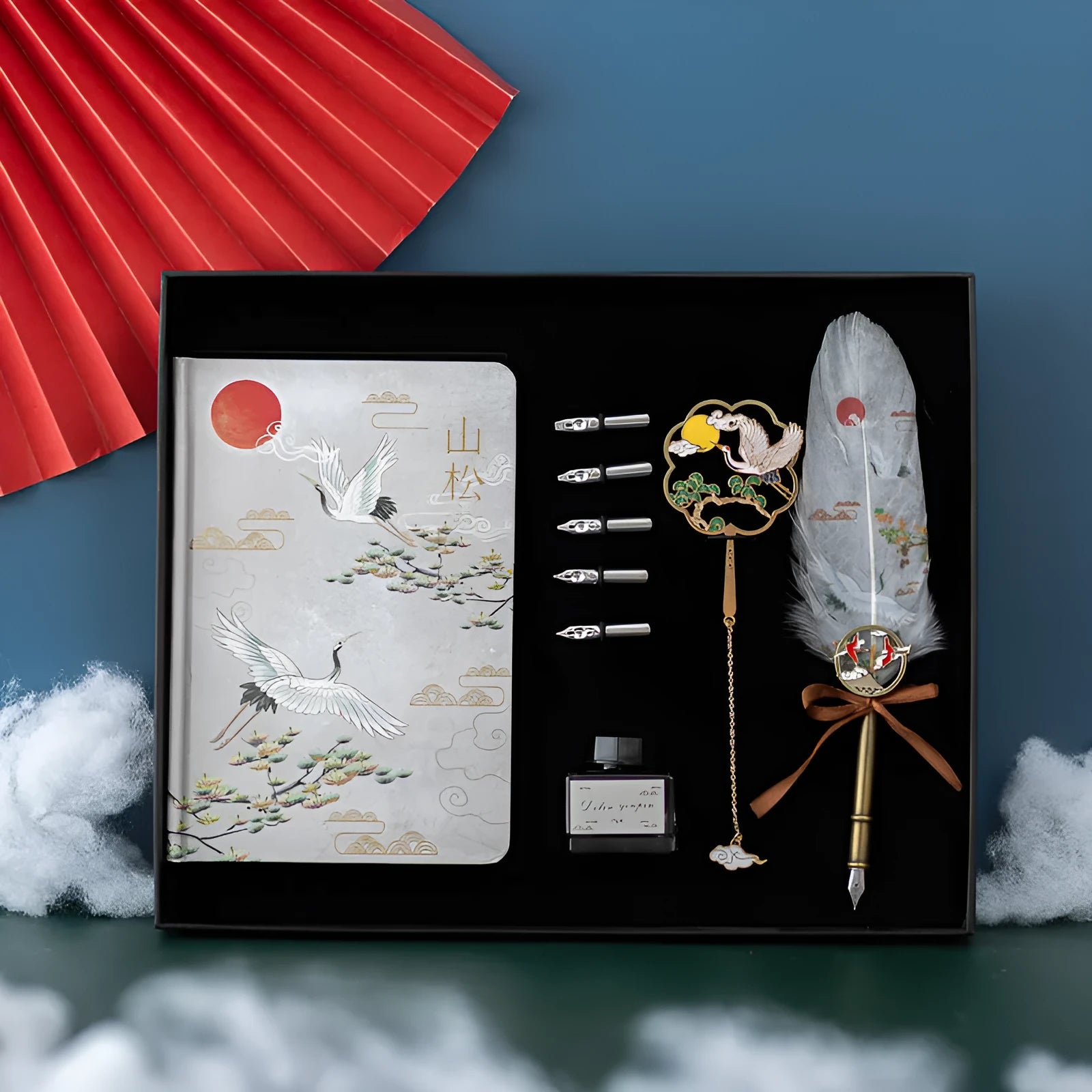 Chinese style feather pen with metal shell and matching jianhegui notebook in gift set.