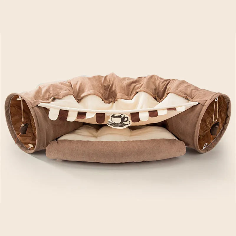 Collapsible cloth cat tunnel shown in a pop-up cylinder shape and folded flat, in a choice of colours.