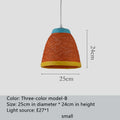Natural woven rattan ball hanging pendant lamp with an adjustable cord.