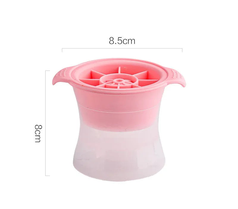 Silicone ice tray showing hockey puck shaped moulds alongside pentagon and spherical designs in light blue colour
