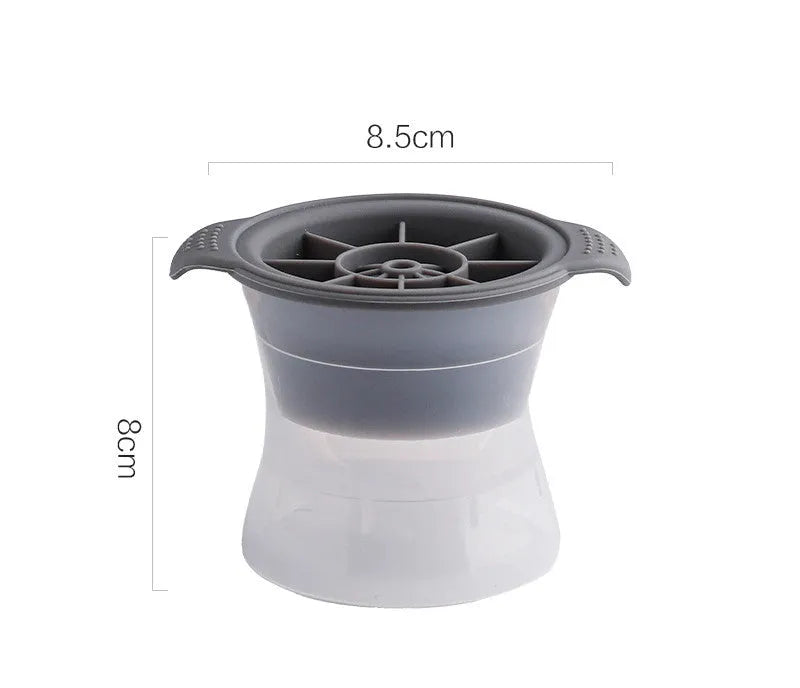 Silicone ice tray showing hockey puck shaped moulds alongside pentagon and spherical designs in light blue colour