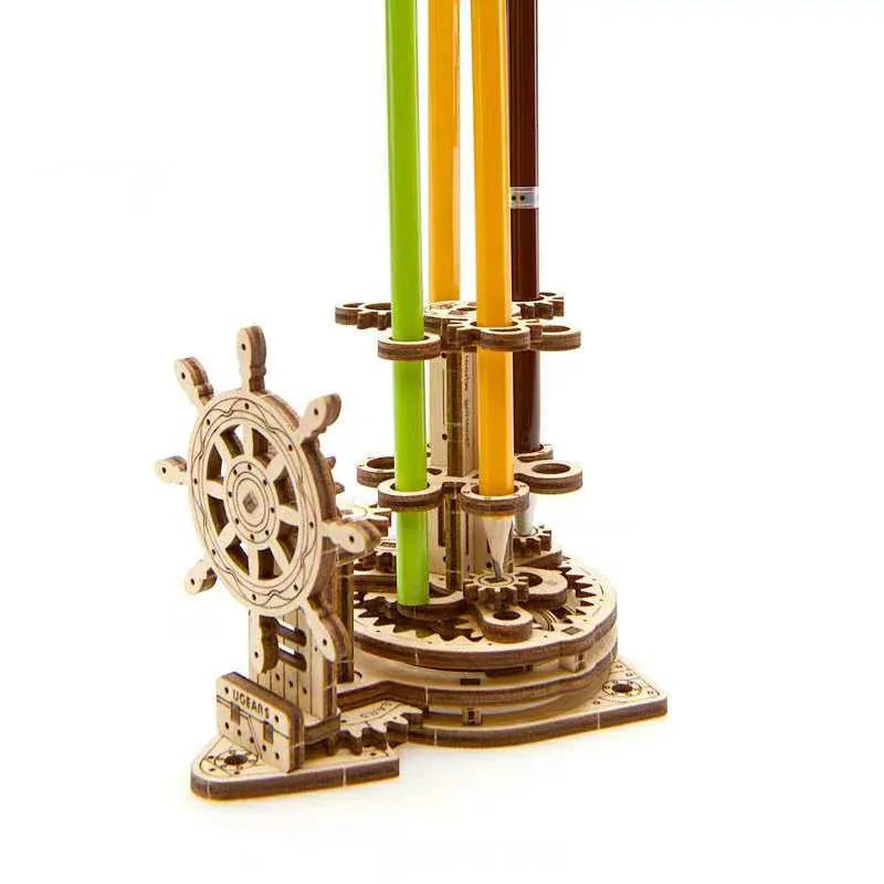 Ukrainian wooden rotating pen holder model showing steering wheel mechanism.