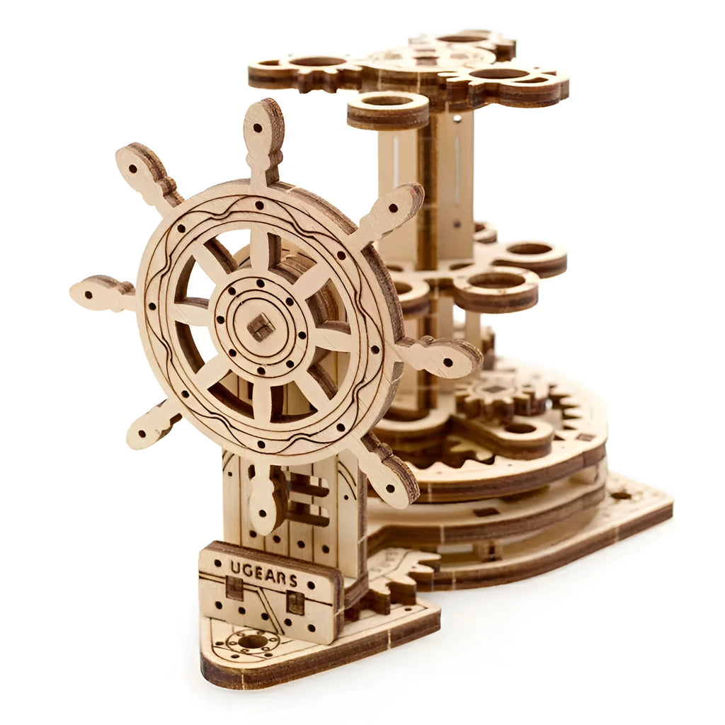 Ukrainian wooden rotating pen holder model showing steering wheel mechanism.