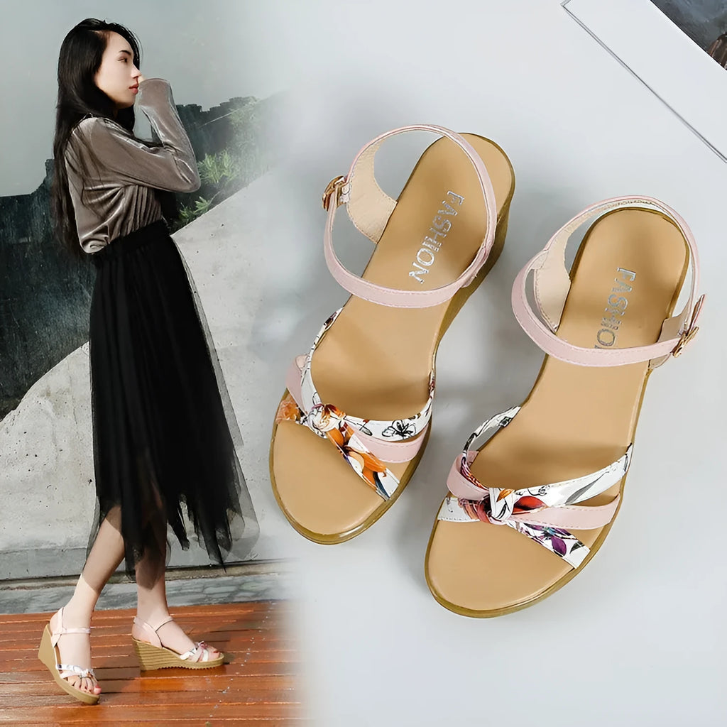 Women's pink wedge sandals with a thick heel, non-slip sole, and a single buckle strap.