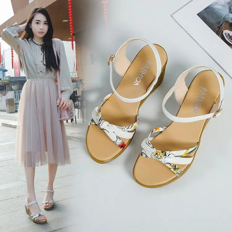 Women's pink wedge sandals with a thick heel, non-slip sole, and a single buckle strap.