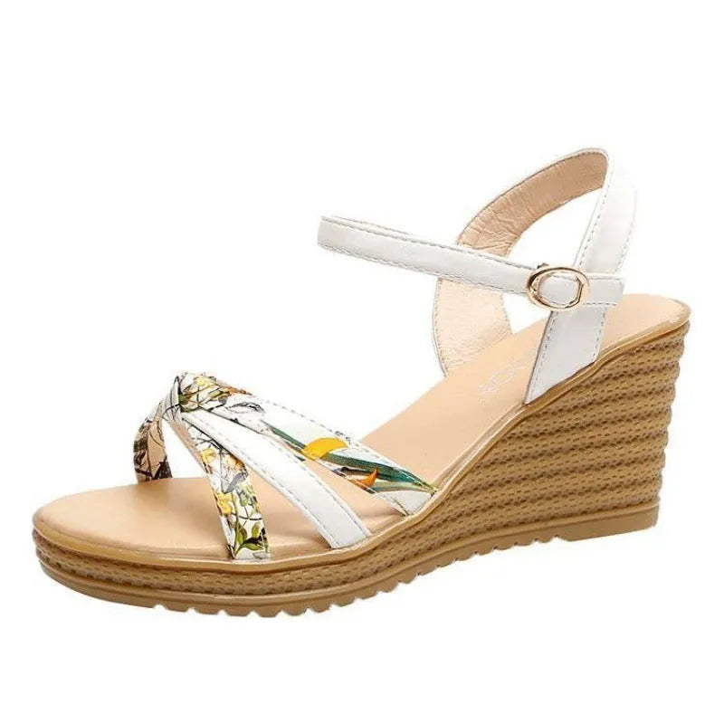 Women's pink wedge sandals with a thick heel, non-slip sole, and a single buckle strap.
