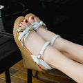 Women's pink wedge sandals with a thick heel, non-slip sole, and a single buckle strap.