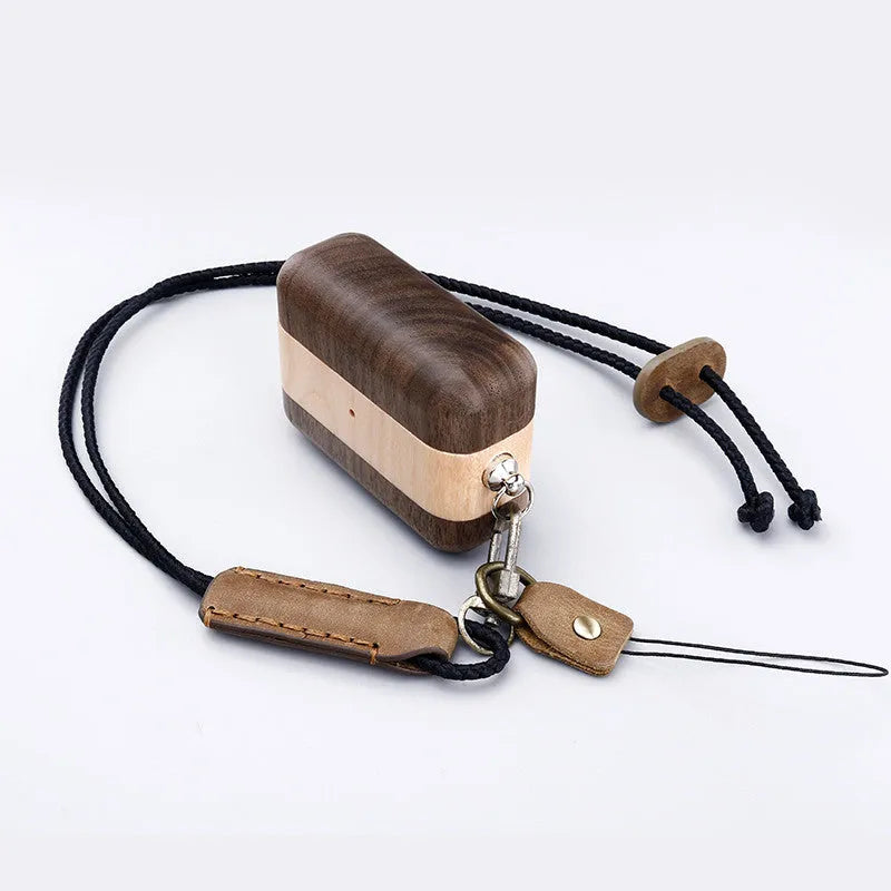 Solid wood hard shell case for Bluetooth earphones compatible with Apple iPhones, shown in various wood finishes.