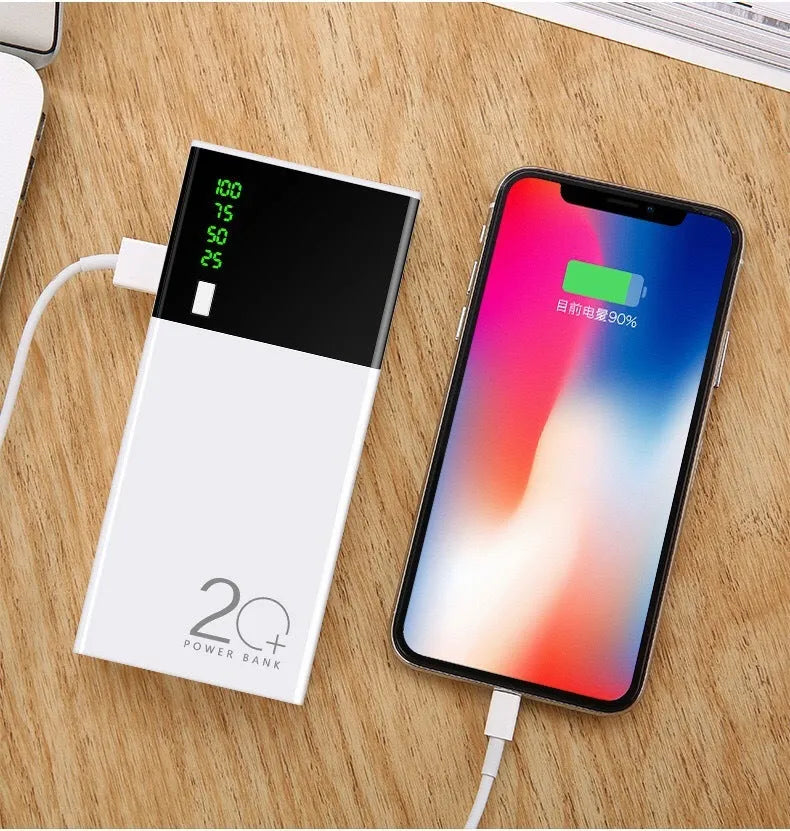 Black 20000mAh portable power bank with plastic shell showing dimensions of 135mm by 60mm