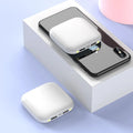 Compact black portable power bank with 20000mAh capacity and a small LED flashlight on its side.