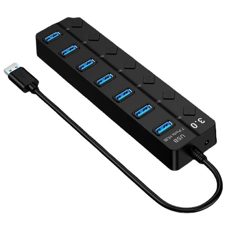 Black 7-port USB 3.0 hub with external power adapter showing seven USB ports