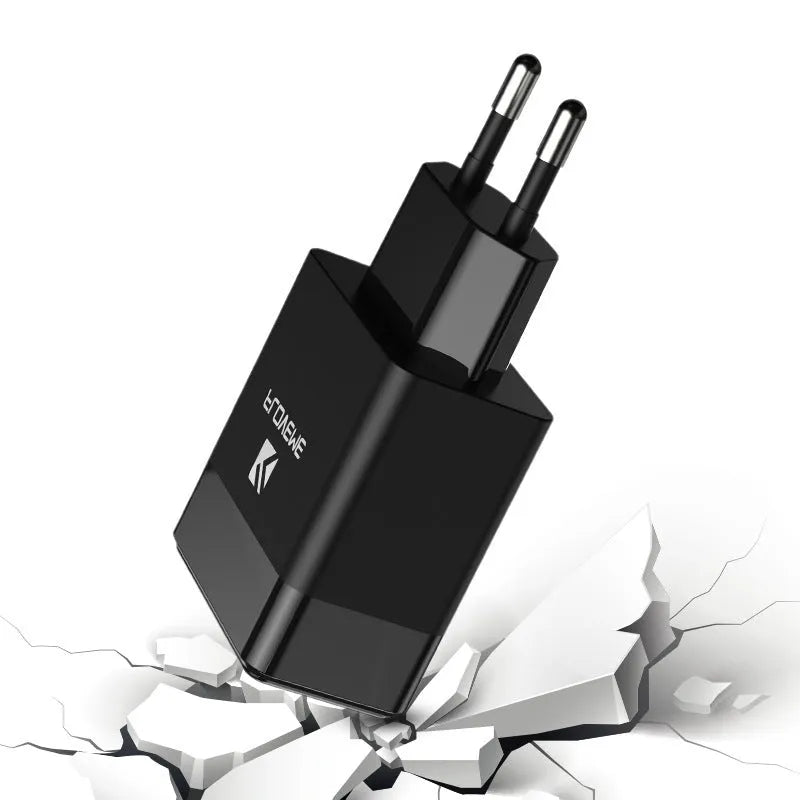 Black and white dual voltage travel charger with USB port for European and American standards