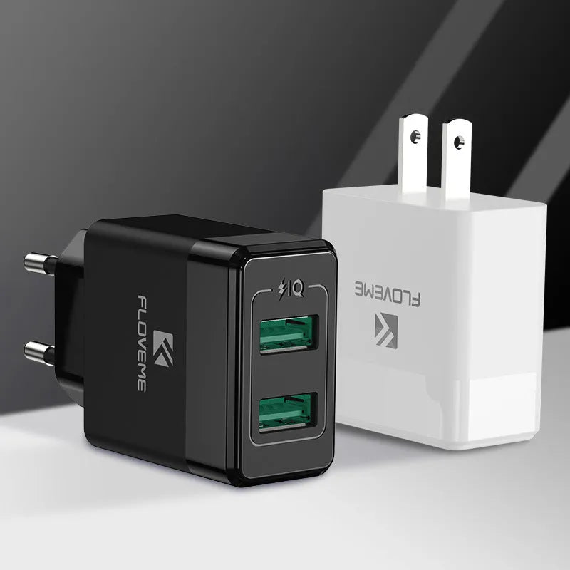 Black and white dual voltage travel charger with USB port for European and American standards