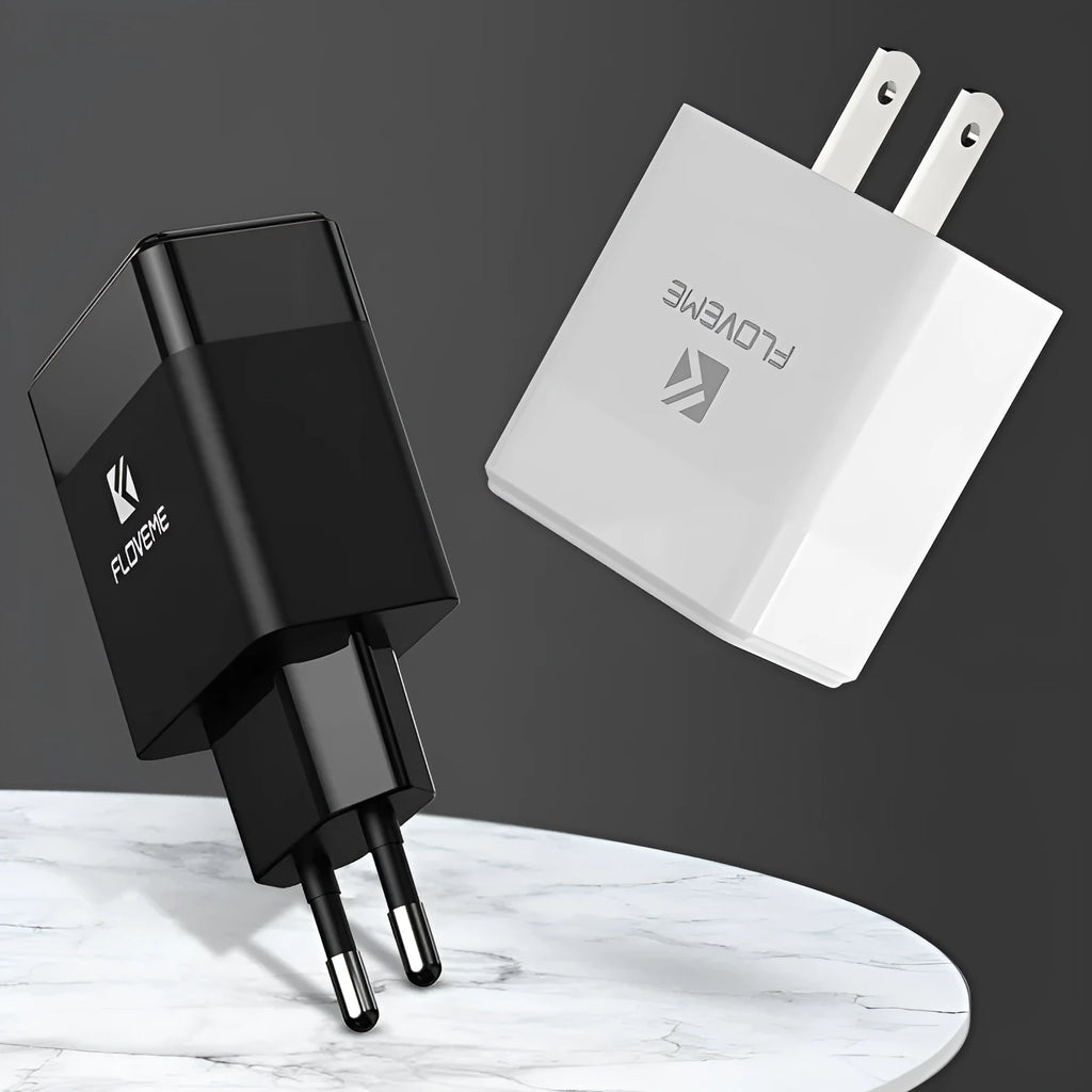 Black and white dual voltage travel charger with USB port for European and American standards