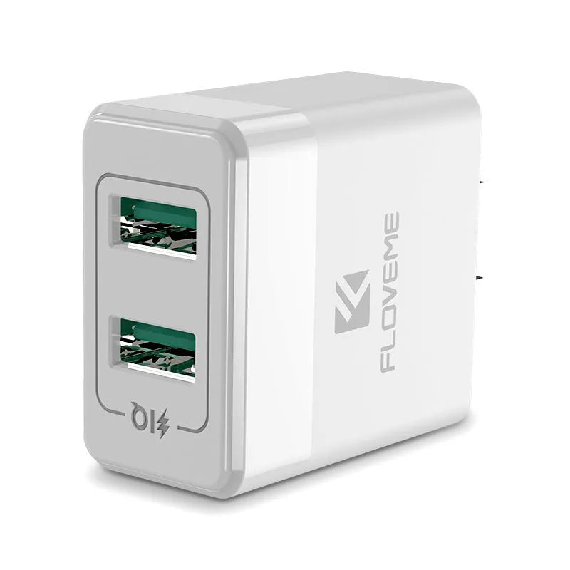 Black and white dual voltage travel charger with USB port for European and American standards