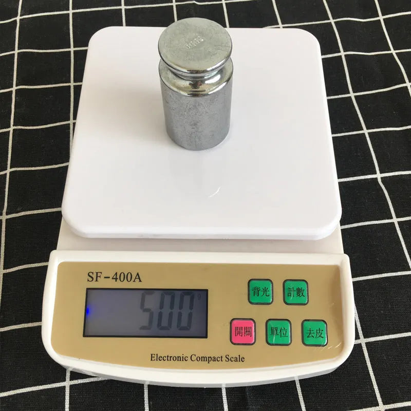 SF-400A electronic kitchen scale with digital display, battery compartment, and weighing platform