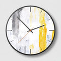 Round abstract art wall clock with metal frame in Mysterious Black, available in 12 inch and 14 inch sizes.