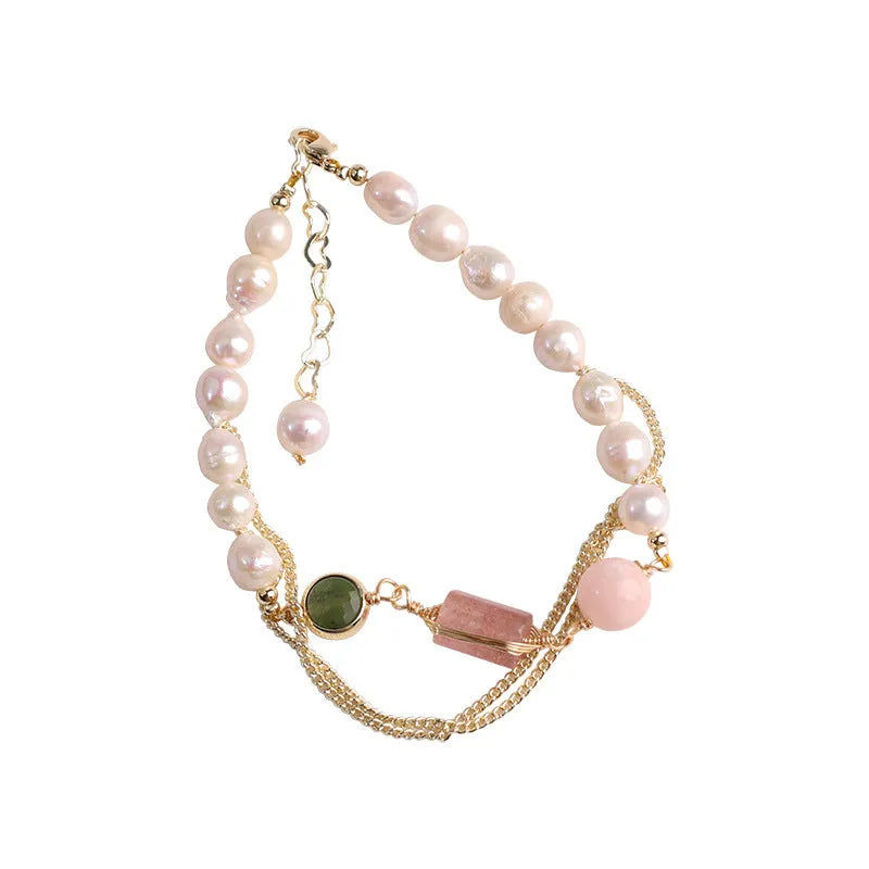 Women's pink bracelet with freshwater pearls and strawberry crystal charms in geometric design