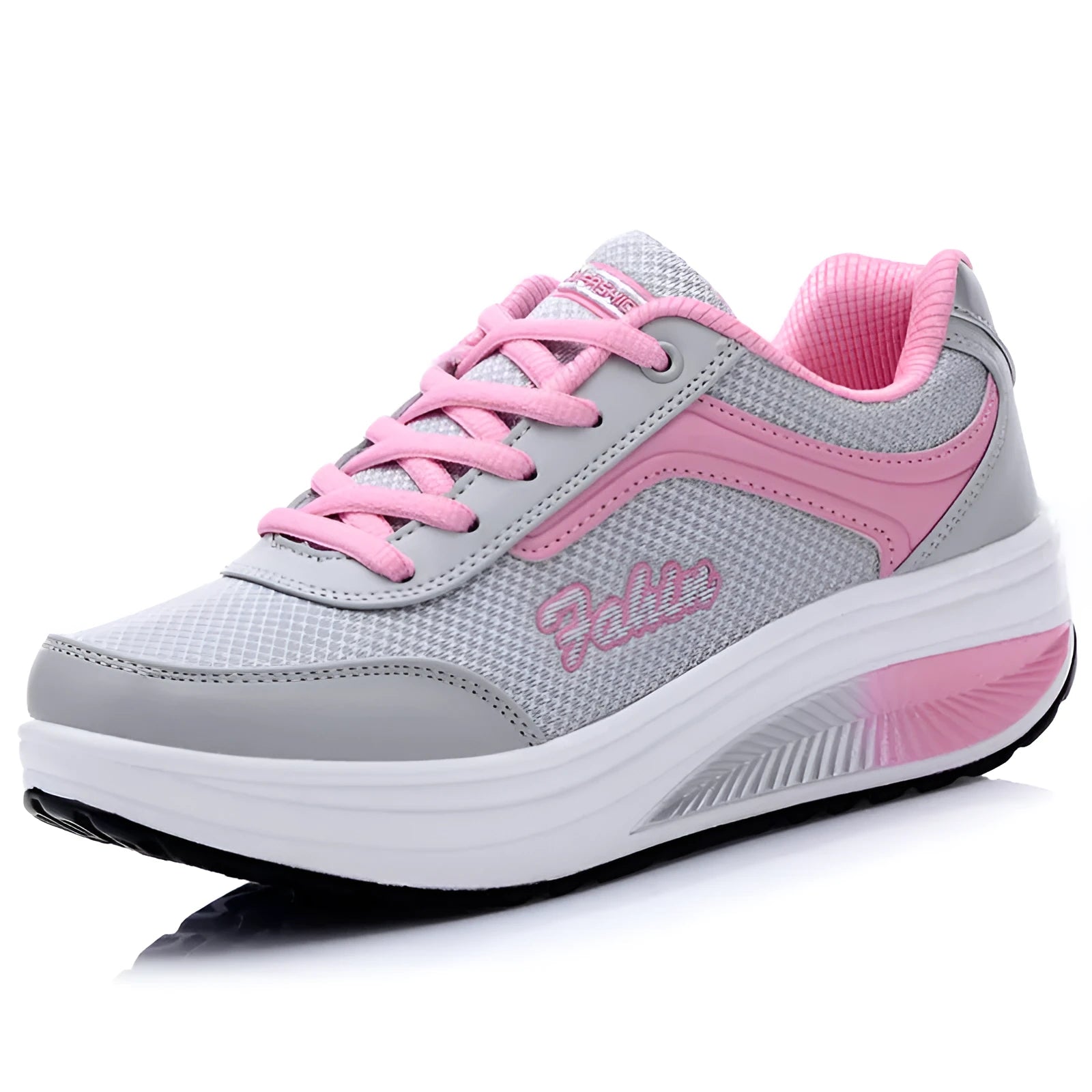 A pair of women's grey powder travel sports shoes with a mid-height heel on a white background.