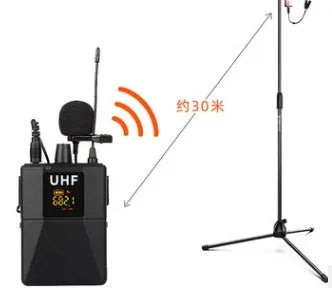 Black Little Bee X3 wireless lavalier microphone and its charging case on a table.
