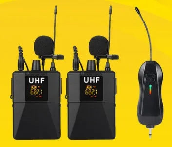 Black Little Bee X3 wireless lavalier microphone and its charging case on a table.