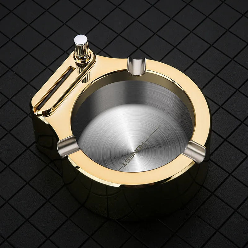 Large blue metal cigarette ashtray with a built-in permanent match lighter and three cigarette slots.