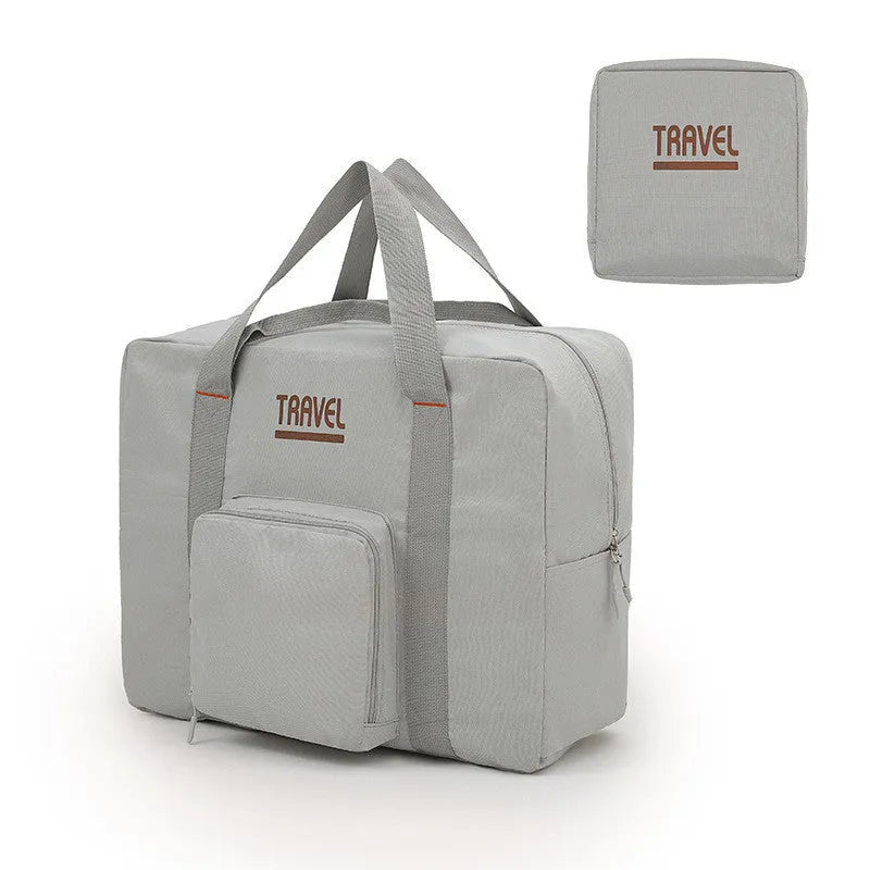 Cube-shaped black travel storage bag made from 300D Oxford cloth for clothing organisation.