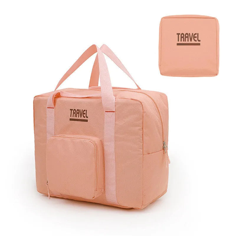 Cube-shaped black travel storage bag made from 300D Oxford cloth for clothing organisation.