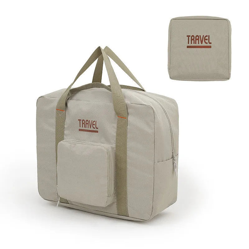 Cube-shaped black travel storage bag made from 300D Oxford cloth for clothing organisation.