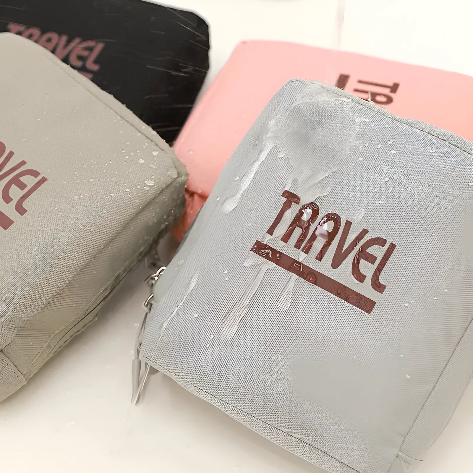 Cube-shaped black travel storage bag made from 300D Oxford cloth for clothing organisation.