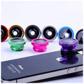 Three-in-one smartphone camera lens kit showing fisheye, wide-angle, and macro lenses with a universal clip.