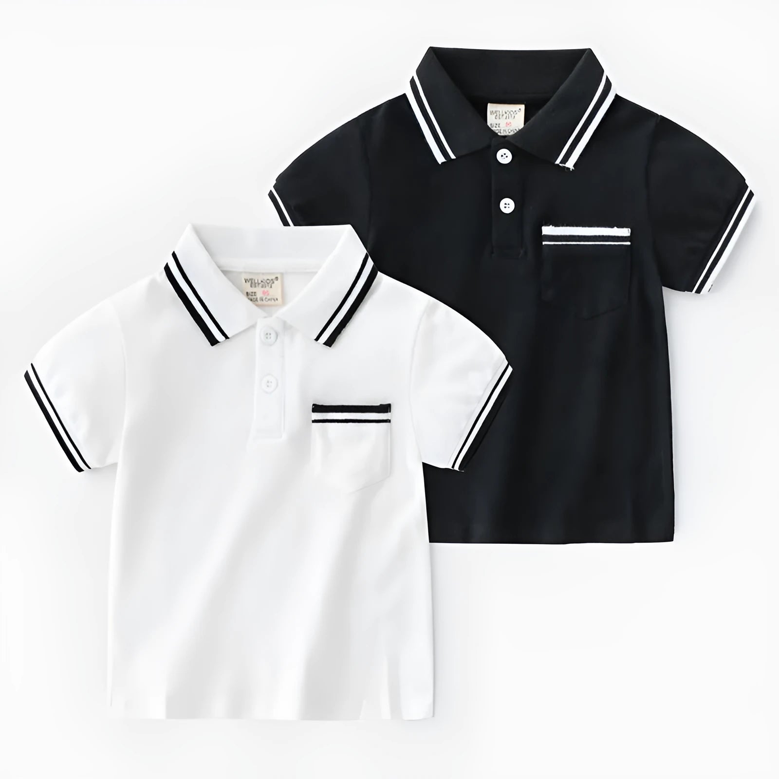 Boys plain cotton polo shirt in white or black with short sleeves and round neck.