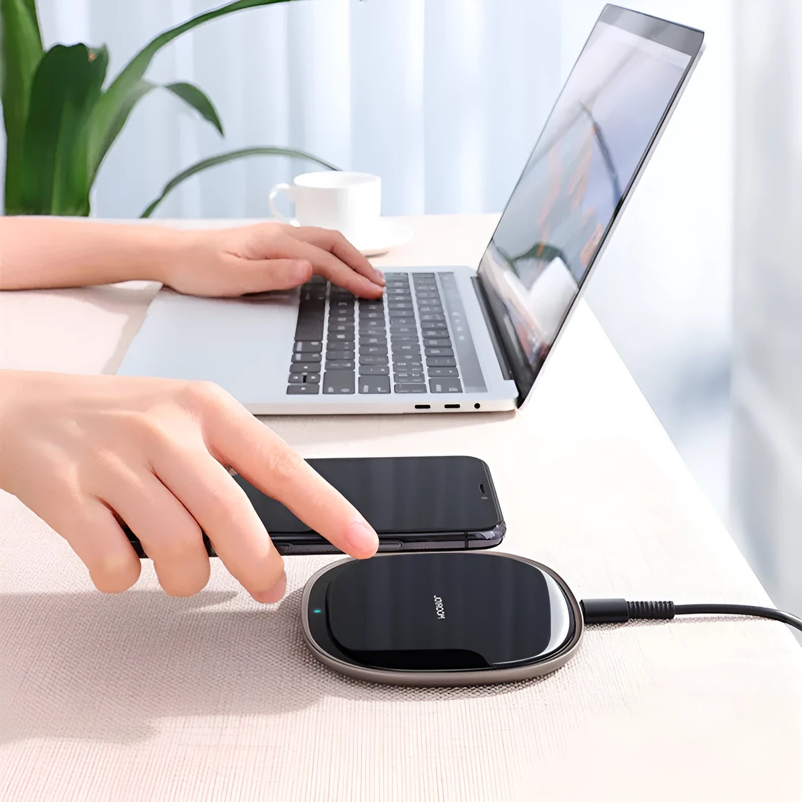 Black 15W fast wireless charging pad with glass top surface and compact square design.