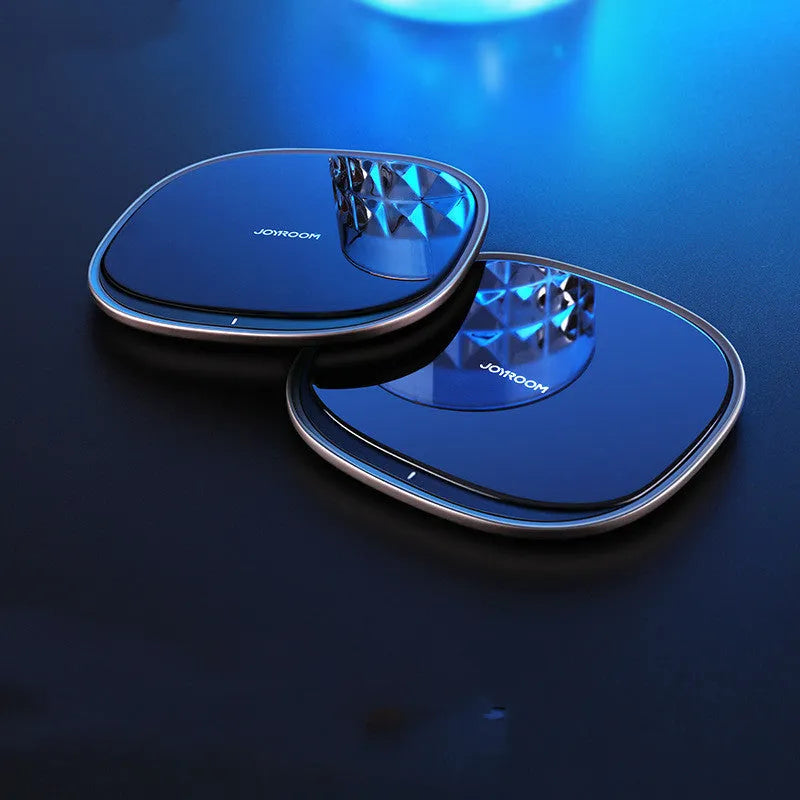 Black 15W fast wireless charging pad with glass top surface and compact square design.