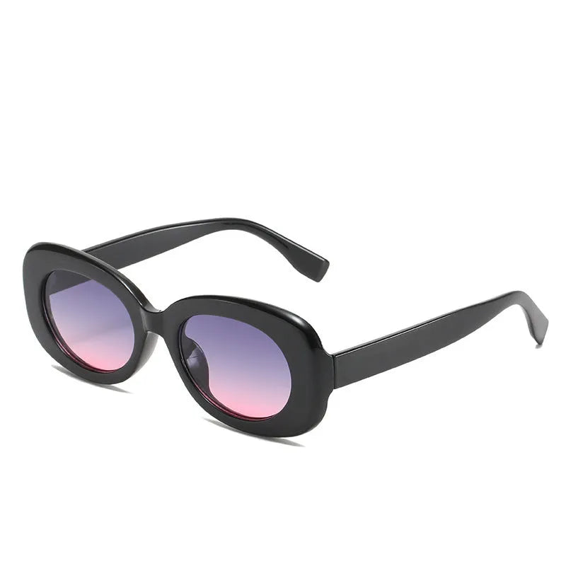 Women's oval fashion sunglasses with black frame and UV400 protection