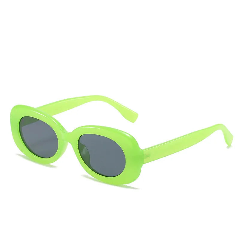 Women's oval fashion sunglasses with black frame and UV400 protection