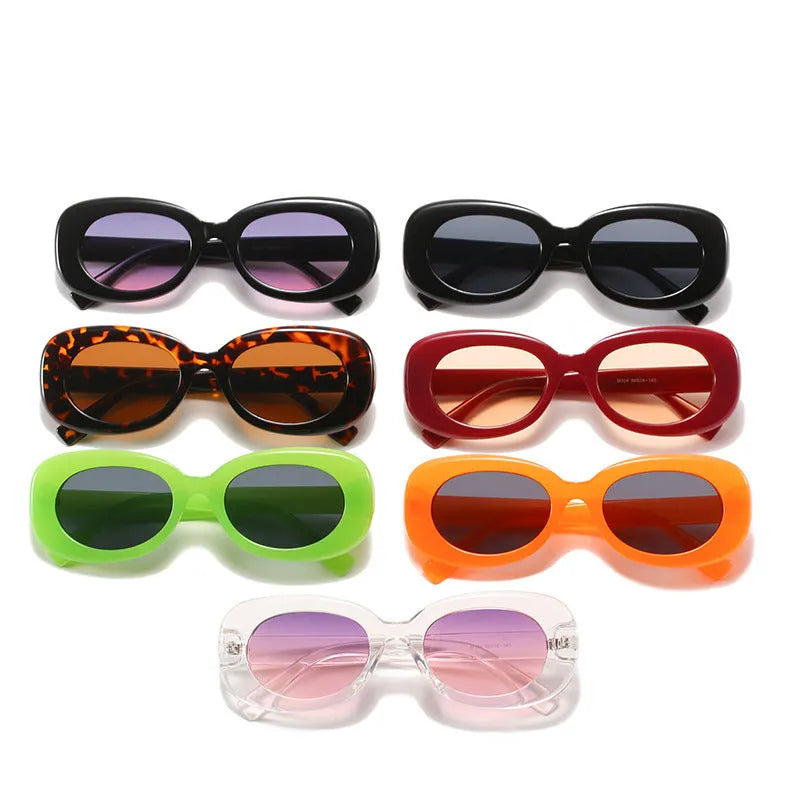 Women's oval fashion sunglasses with black frame and UV400 protection