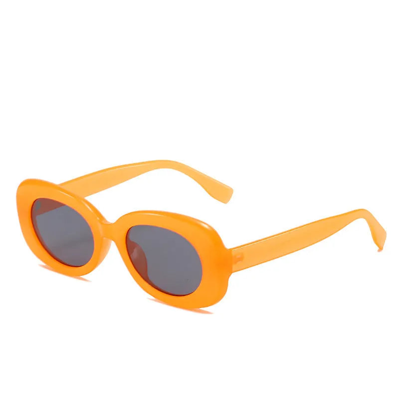 Women's oval fashion sunglasses with black frame and UV400 protection