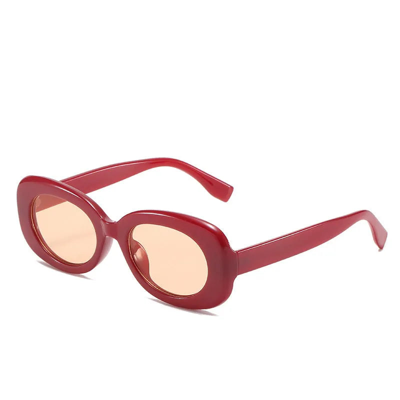 Women's oval fashion sunglasses with black frame and UV400 protection