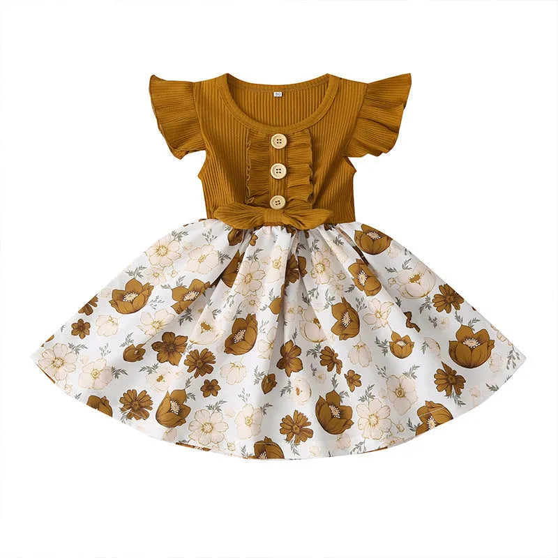 Sleeveless summer dress for toddler girl on a hanger, shown in one of the available colours.