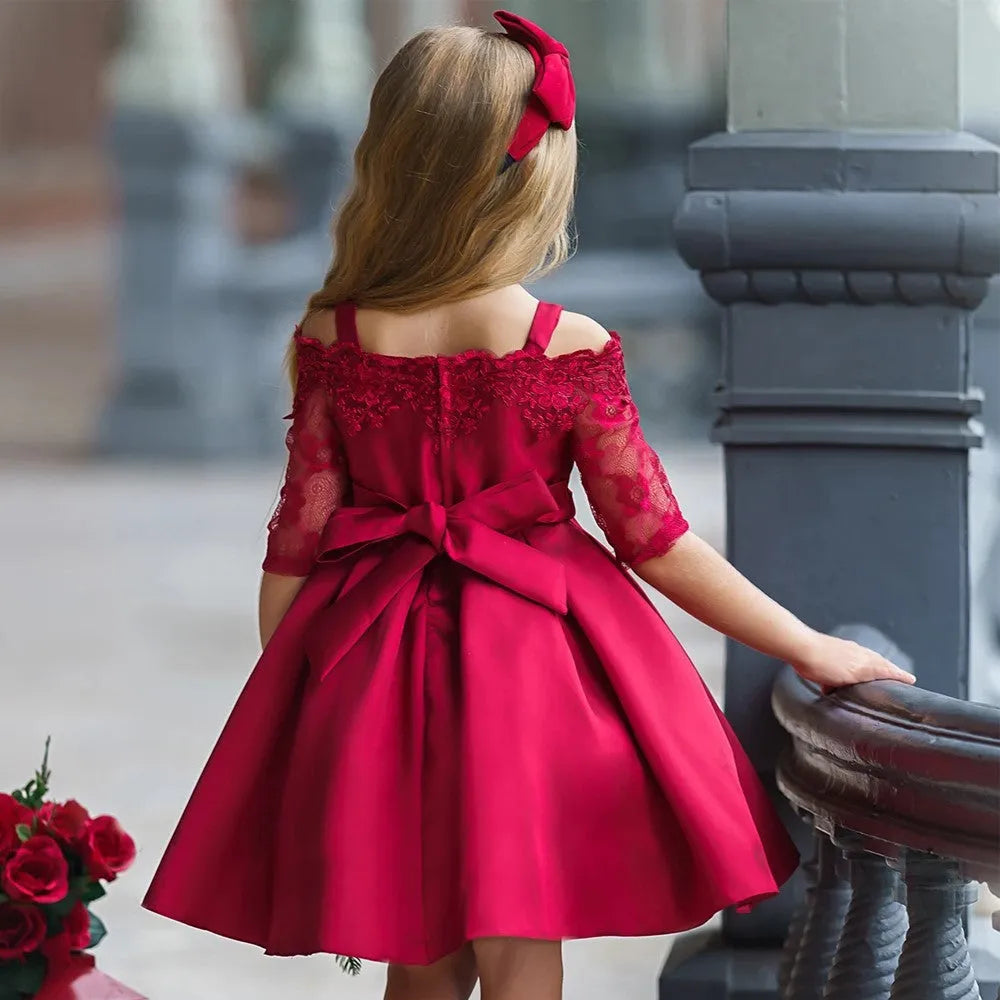 Girls lace-trimmed polyester dress in deep red colour showing simple design with decorative lace details