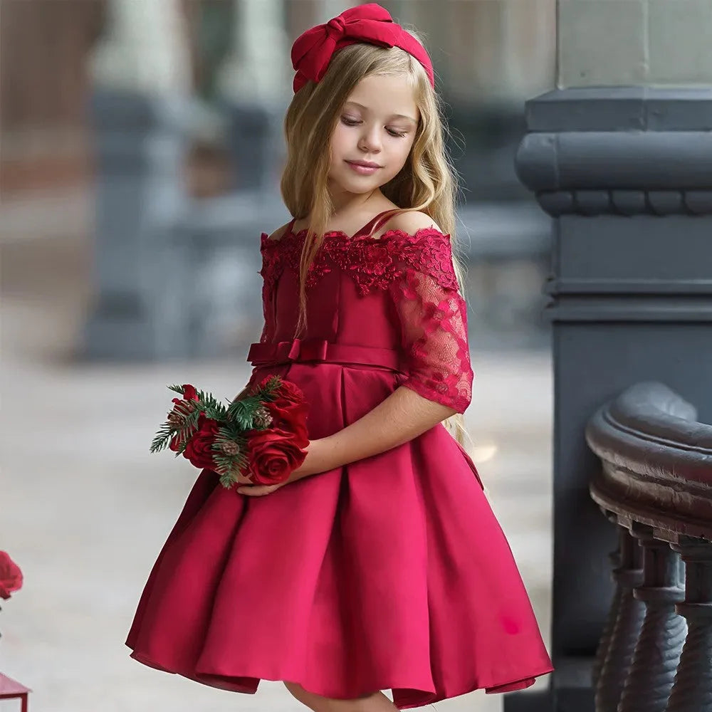 Girls lace-trimmed polyester dress in deep red colour showing simple design with decorative lace details