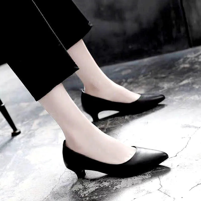 Silver and black women's stiletto bridal shoes with crystal decoration, showing different heel heights.