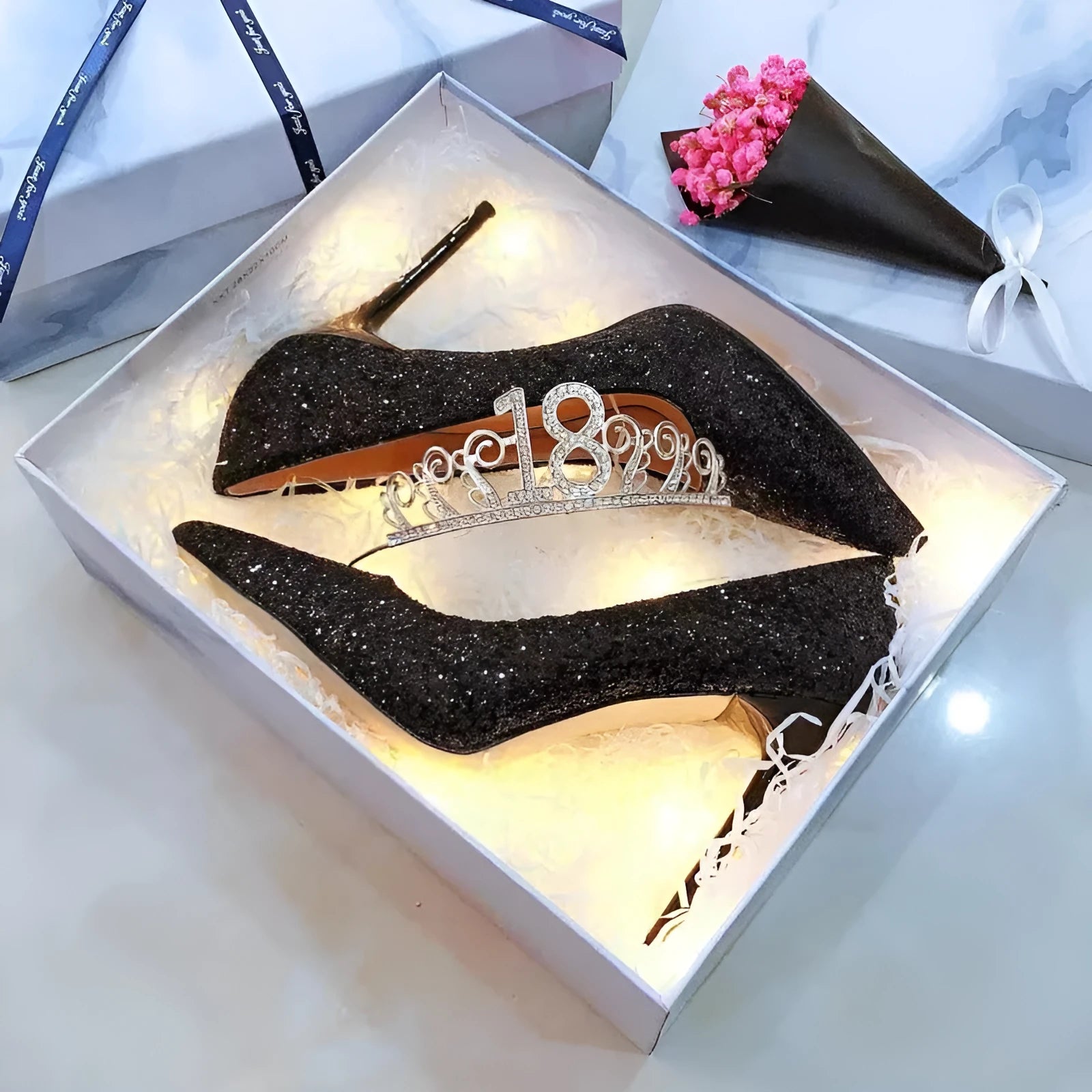 Silver and black women's stiletto bridal shoes with crystal decoration, showing different heel heights.