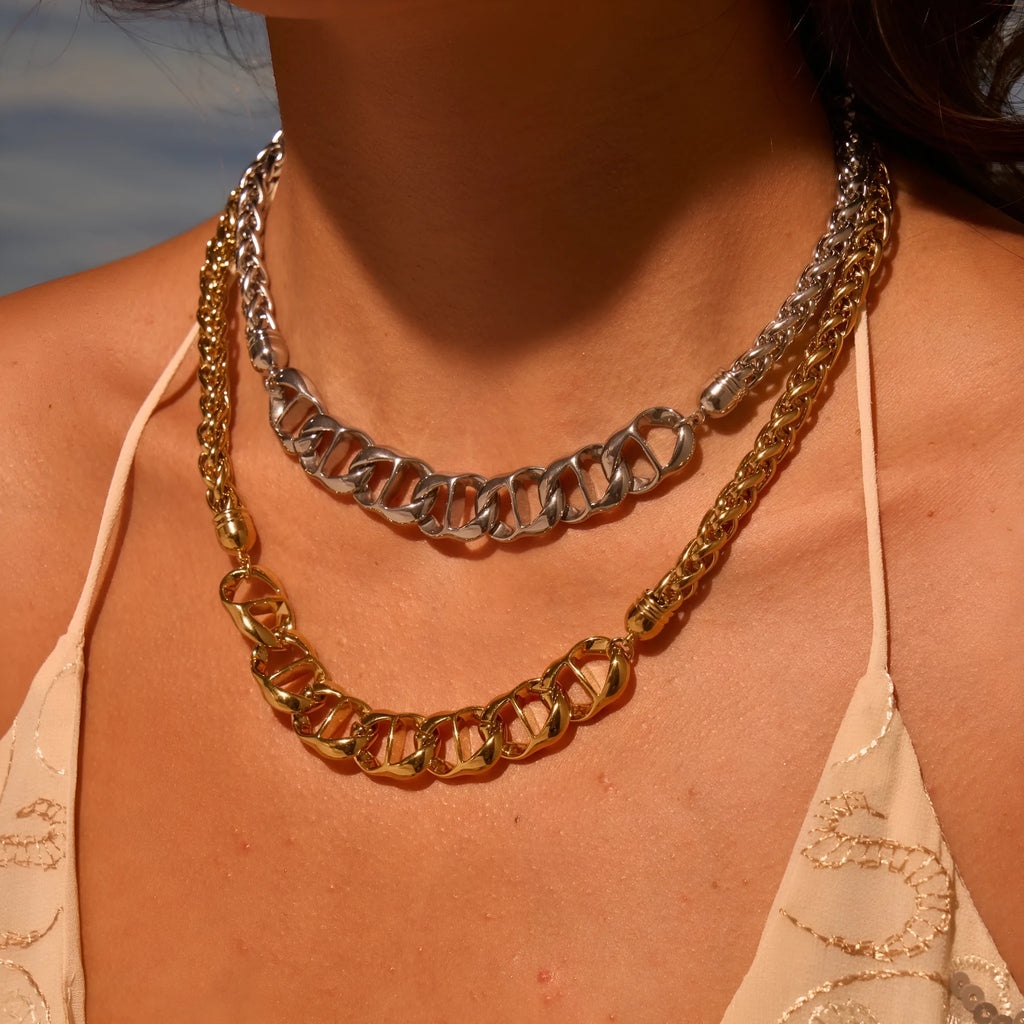 Stainless steel necklace with gold electroplated finish and geometric pendant design